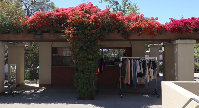 The Concession Stand on the Occidental College campus, now Touchdown thirft store with a rack of clothing out front