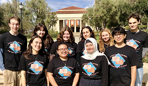 Group of students wearing Language to the Mind t-shirts