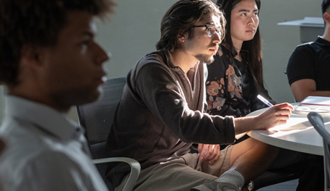 Occidental students take notes in class on the Los Angeles campus.