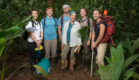 Occidental College students with their professor conducting research in a jungle in Costa Rica