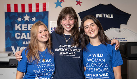 oxy students wearing campaign t-shirts with the slogan "A Wild Woman Belongs in the House Susan Wild"