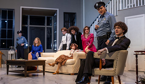 A group of Occidental (Oxy) students acting in a play onstage