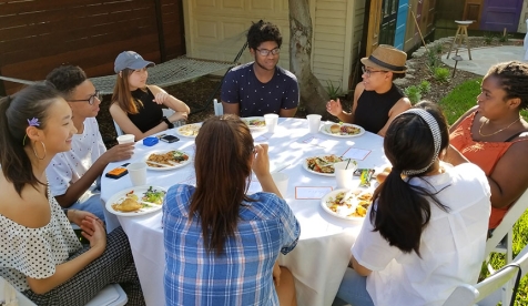 Students sitting at a table at a MVP event