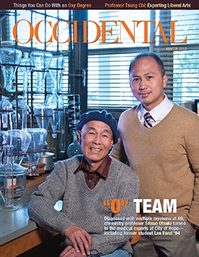 Chemistry Professor Tetsu Otsuki and Len Farol '94 pose in f