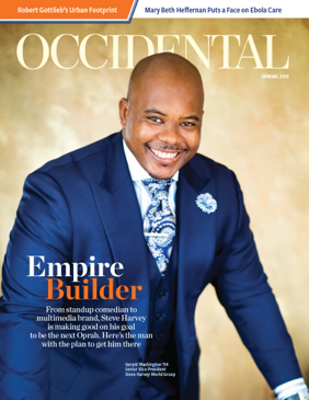 A man in a blue suit smiling brightly. Cover story: Empire B