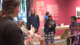 Teacher explaining workshop themes.