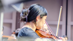 Student playing violin 