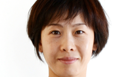 Woman in front of white background