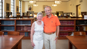 Portrait of Barbara and Michael Gibby in the Occidental College library