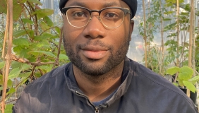 Marvin Browne in front of plants