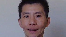 Man in front of white background