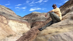 Man sitting on hillside
