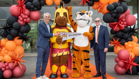The presidents of Occidental College and Pasadena City College post with their schools' respective mascots