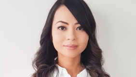 Woman in white shirt in front of white background