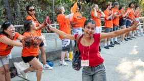 O-Team member cheer on new students as they walk into Remsen Bird Hillside Theater