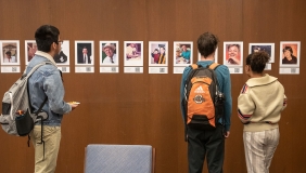 Students looking at an interactive exhibit in the Oxy library