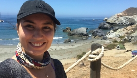 Dr. Maria Ruggeri in front of coastline