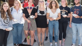students posing in front of HCC