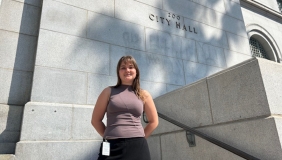 Occidental student in front of City Hall 