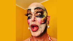 Drag performer Taylor Mac with huge false eyelashes and dramatic, glittery makeup
