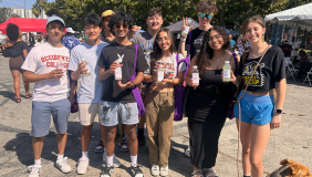 Yemale Febres '27 with the 2023 MSI cohort, standing together and smiling in the sunshine