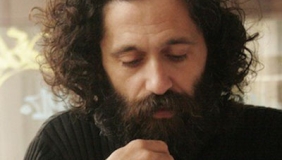 Gil Anidjar headshot in black turtleneck