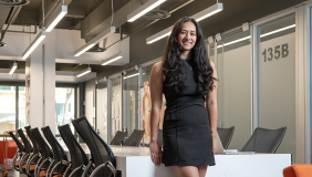 ASOC President Trisha Bhima standing in the ASOC office at Occidental College