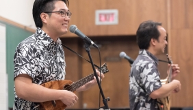 Jason Arimoto and Daniel Ho perform for students