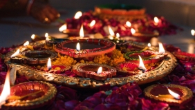 Stock image of diyas (candles) lit for Diwali
