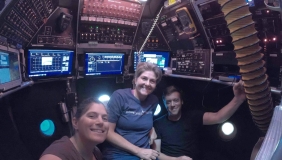 Shana Goffredi, Victoria Orphan and pilot Danik Forsman inside the Alvin submarine