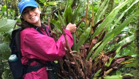 Photo of Dr. Lindsay McCulloch in front of plants