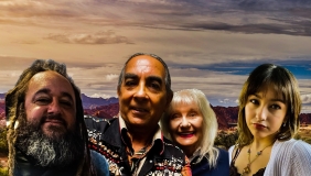 Photo of Robert Dorame and family in front of landscape