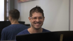 Assistant professor Adam Schoenberg seated at his piano in Booth Hall at Occidental College in Los Angeles on Wednesday, Sep. 11, 2019. Miles Koupal/The Occidental