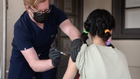 james vaccinating a student