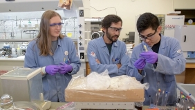 Prof. Jeffrey Cannon and students in the chemistry lab