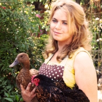 Photo of Jordanne Dervaes holding a duck