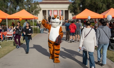Oswald greets visitors to campus during Explore Occidental Fall Preview Day in November 2023.