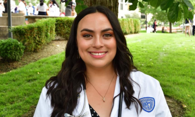 Hollie Adams in a white coat