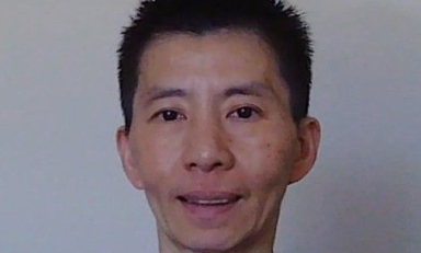 Man in front of white background