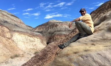 Man sitting on hillside