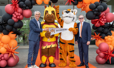 The presidents of Occidental College and Pasadena City College post with their schools' respective mascots