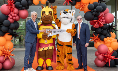The presidents of Occidental College and Pasadena City College post with their schools' respective mascots