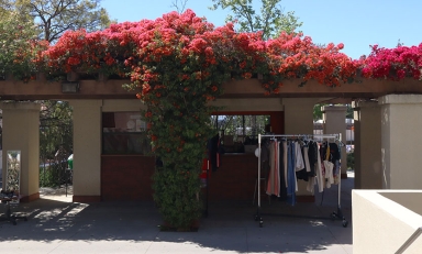 The Concession Stand on the Occidental College campus, now Touchdown thirft store with a rack of clothing out front