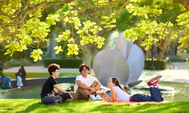 Occidental students relax near Lucille Gilman Fountain on an idyllic fall afternoon.
