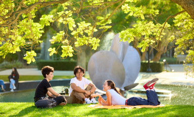 Occidental students relax near Lucille Gilman Fountain on an idyllic fall afternoon.