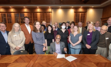 President Harry J. Elam, Jr. signs the Second Nature Climate Pledge