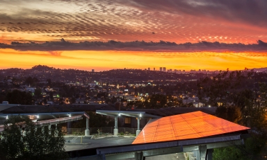 Occidental's solar array reflects a colorful sunset in 2014. 