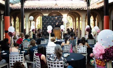 A seated group of Occidental students and staff at the annual Student Leadership Awards on Branca Patio