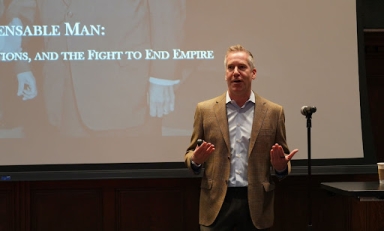 Kal Raustiala presenting in Choi Auditorium