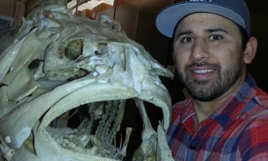 Dr. Chris Martinez with fish skeleton